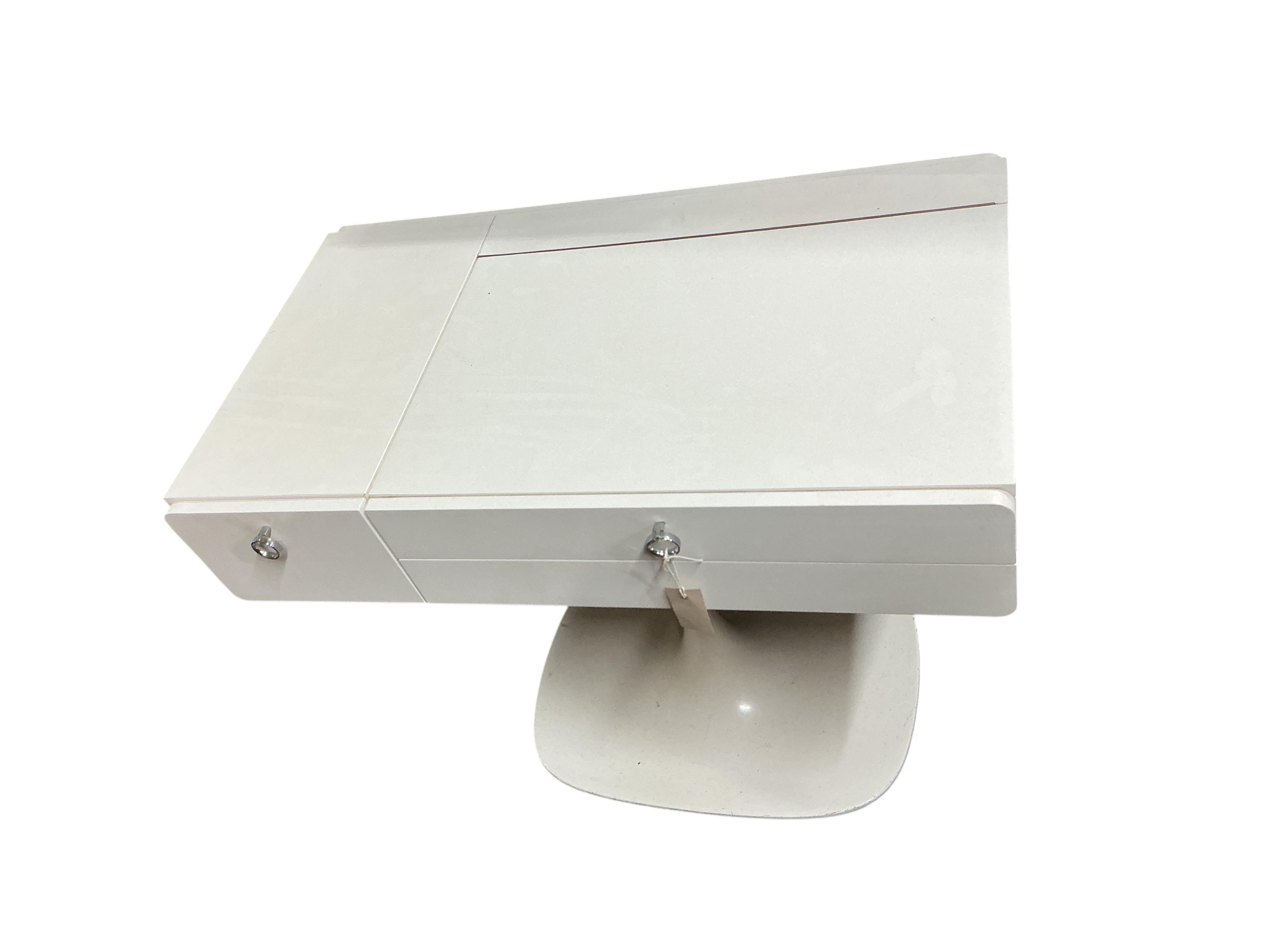 A 1960’s white tulip base dressing table, width 84cm, depth 48cm, height 66cm